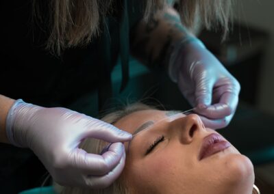 woman receiving microblading