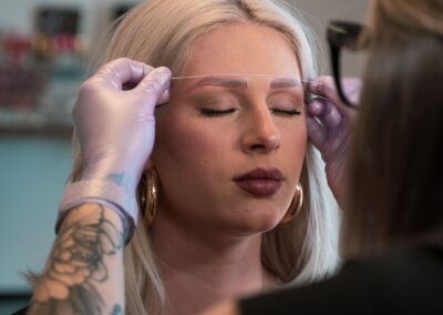 woman receiving microblading