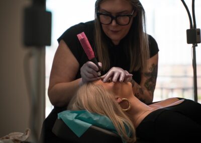 woman conducting Microblading