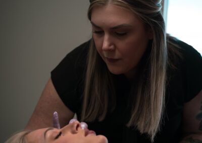 woman receiving microblading